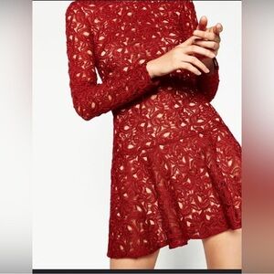 Burgundy lace Zara dress with ruffle bottom.